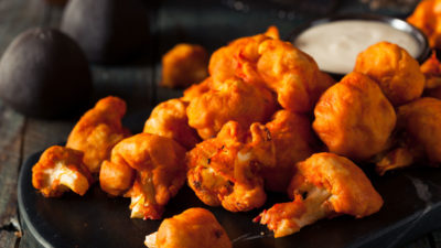 Spicy Breaded Buffalo Chicken Cauliflower with Blue Cheese Sauce